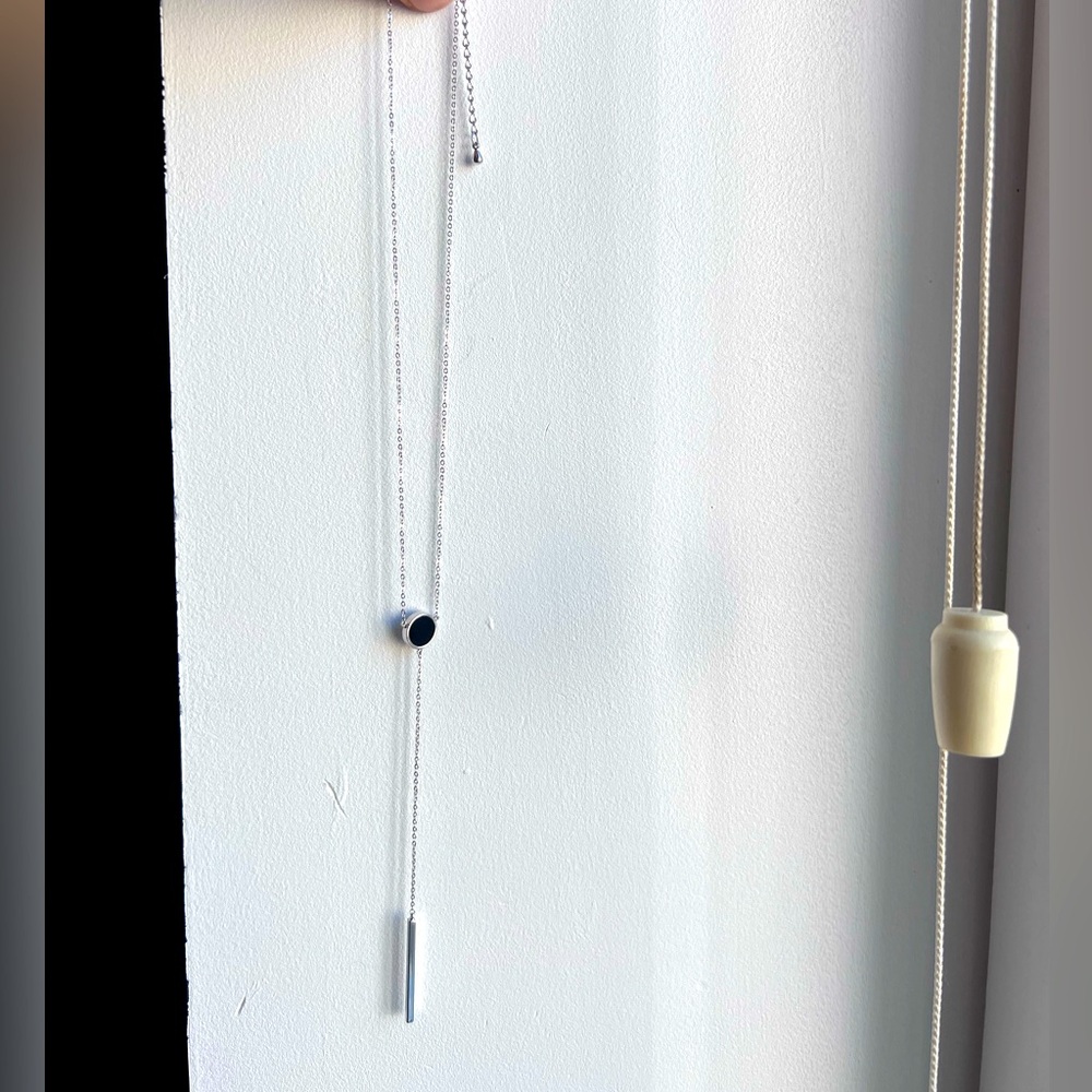 Silver and black enamel pendant necklace